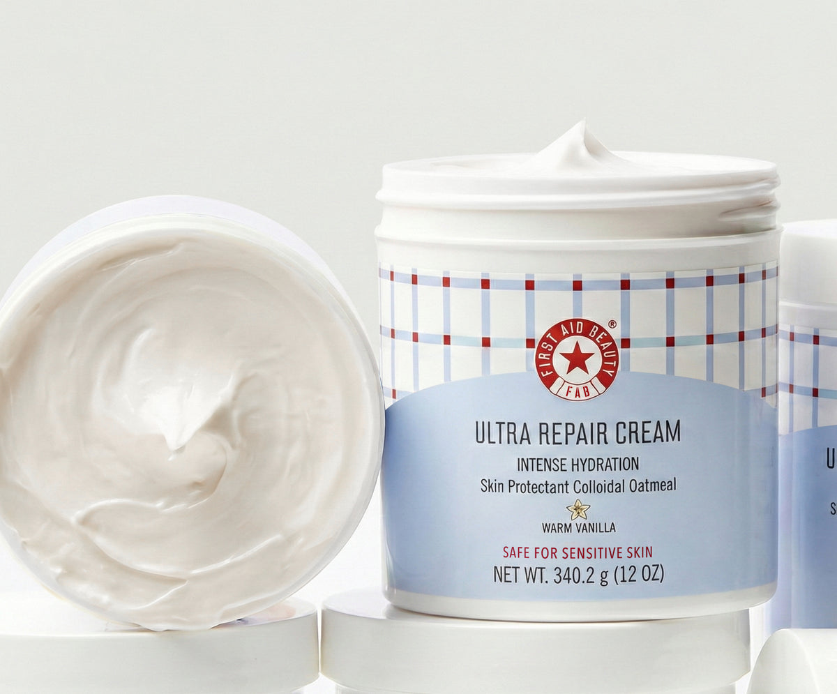 Ultra repair cream jar with visible cream on a white background